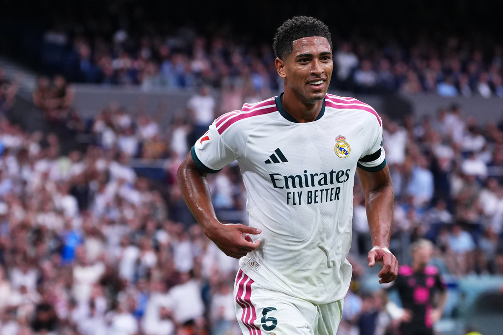 Real Madrid's Jude Bellingham celebrates Malaga's own goal during the La Liga soccer match between Real Madrid and Malaga in Madrid, Spain, Sunday, Aug. 30, 2026. (AP Photo/Manu Fernandez)