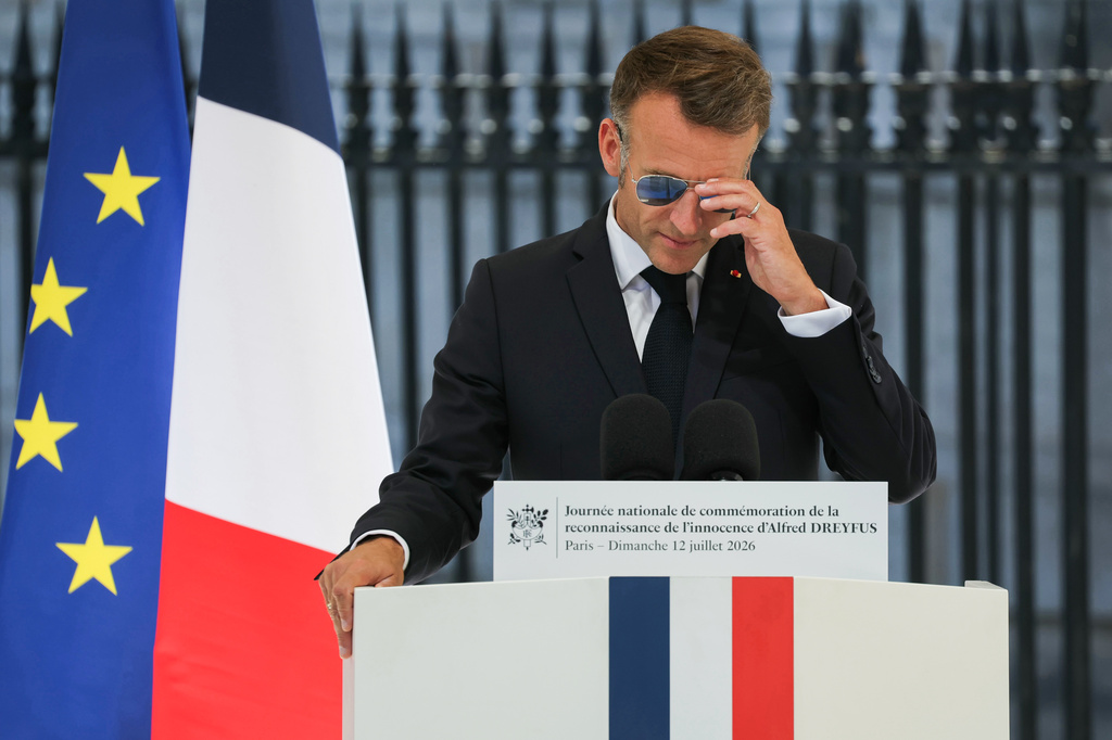 France's President Emmanuel Macron delivers a speech during a tribute ceremony to Captain Alfred Dreyfus on the first national day dedicated to the recognition of his innocence by the Court of Cassation in 1906, and the fight against the resurgence of antisemitism, 120 years later, on the Ile de la Cite near the Cour de Cassation in Paris, Sunday, July 12, 2026. (Thomas Samson/Pool Photo via AP)