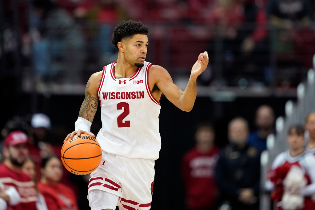 Wisconsin guard Nick Boyd dribbles during the first half of an NCAA college basketball game against Purdue, Saturday, Jan. 3, 2026, in Madison. (AP Photo/Kayla Wolf)