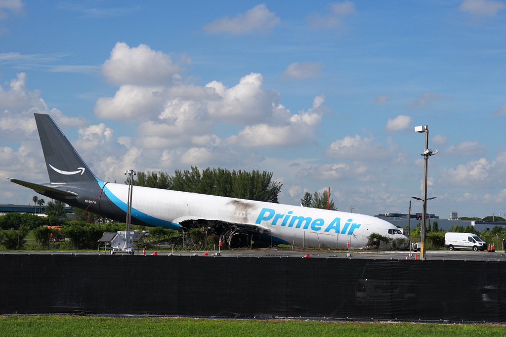 An Amazon cargo plane sits near Miami International Airport two days after overshooting a runway, Tuesday, Sept. 8, 2026, in Miami. (AP Photo/Rebecca Blackwell)