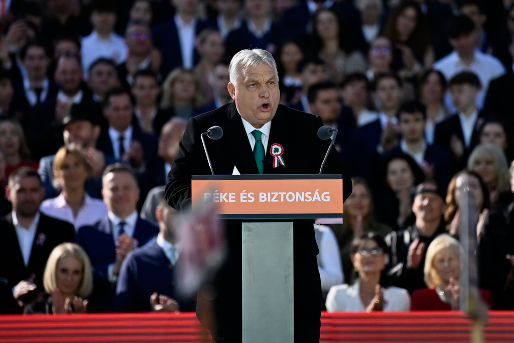 Hungary's Prime Minister Viktor Orban addresses his supporters during a march in Budapest, Hungary, Sunday, March 15, 2026. (AP Photo/Denes Erdos)