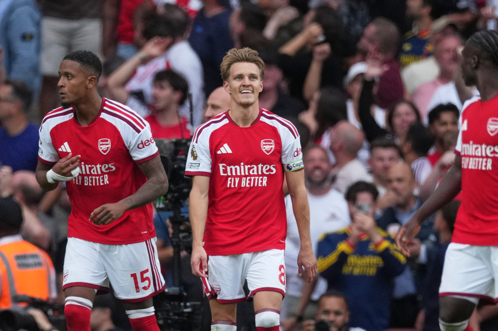 Arsenal's Martin Odegaard, centre, reacts during the English Premier League soccer match between Arsenal and Chelsea in London, Sunday, Sept. 6, 2026. (AP Photo/Dave Shopland)