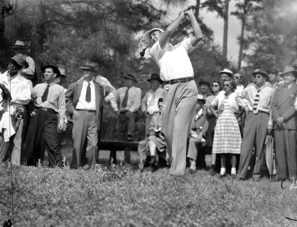 FILE - Herman Keiser drives from the third tee at the Masters golf touranment at Augusta National Golf Club on April 4, 1946, in Augusta, Ga. (AP Photo/File)