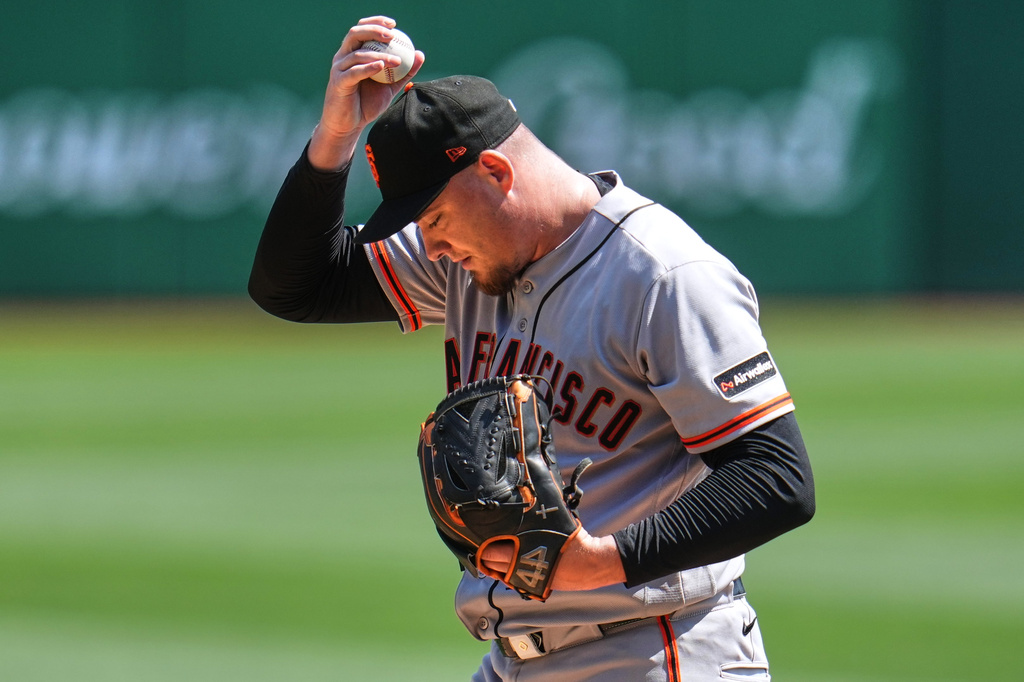 San Francisco Giants pitcher Blade Tidwell collects himself after walking Pittsburgh Pirates' Oneil Cruz, forcing in a run, during the first inning of a baseball game in Pittsburgh, Thursday, Sept. 3, 2026. (AP Photo/Gene J. Puskar)