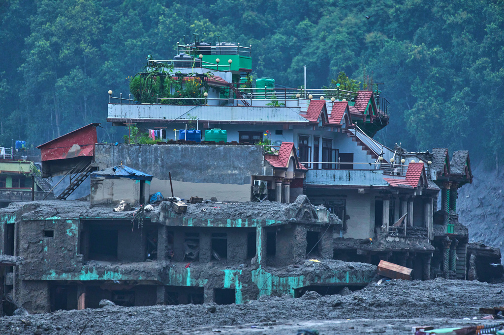 Damage is seen in the aftermath of flash floods in Devighat in the Nuwakot district in Nepal, Thursday, Aug. 27, 2026. (AP Photo/Niranjan Shrestha)
