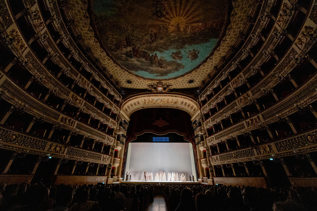 Actors perform during the general rehearsal of Ennio Morricone's only opera, Partenope, at the San Carlo Theatre, in Naples, Italy, Thursday, Dec. 11, 2025. (AP Photo/Salvatore Laporta)