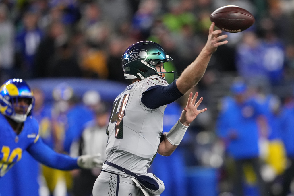 Seattle Seahawks quarterback Sam Darnold throws during the second half of an NFL football game against the Los Angeles Rams, Thursday, Dec. 18, 2025, in Seattle. (AP Photo/Lindsey Wasson)