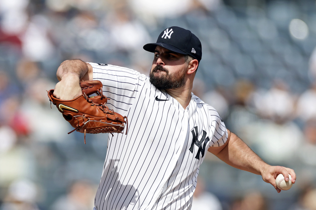 New York Yankees pitcher Carlos Rodon throws in the first inning during the first baseball game of a doubleheader against the Tampa Bay Rays, Tuesday, Sept. 22, 2026, in New York. (AP Photo/Adam Hunger)