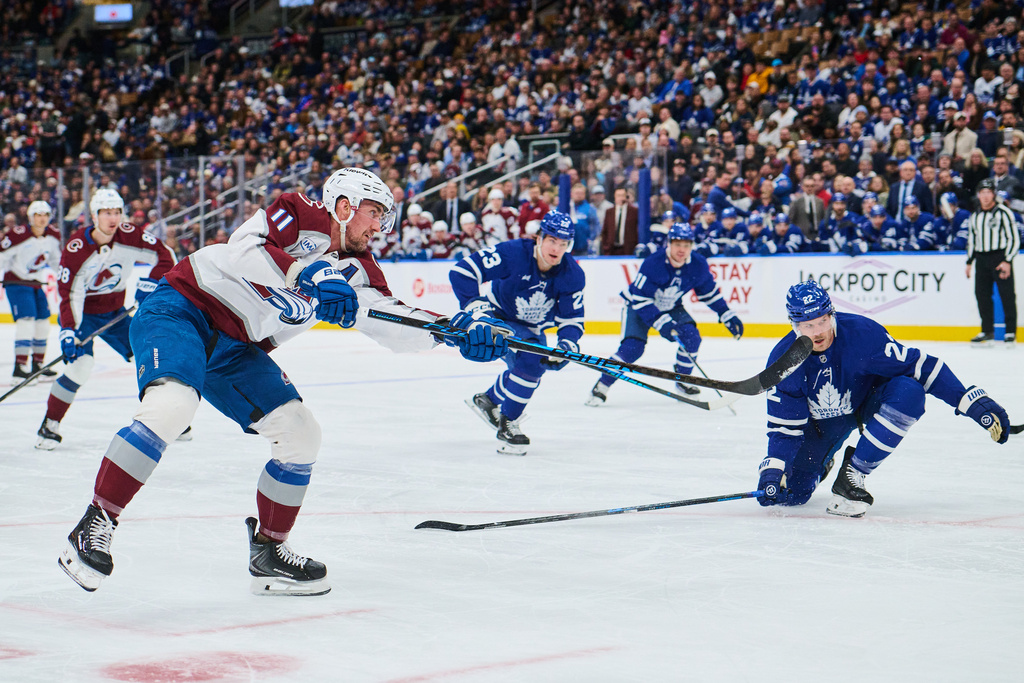 Colorado Avalanche's Brock Nelson (11) scores against the Toronto Maple Leafs during first period NHL hockey action in Toronto, on Sunday, Jan. 25, 2026. (Sammy Kogan/The Canadian Press via AP)