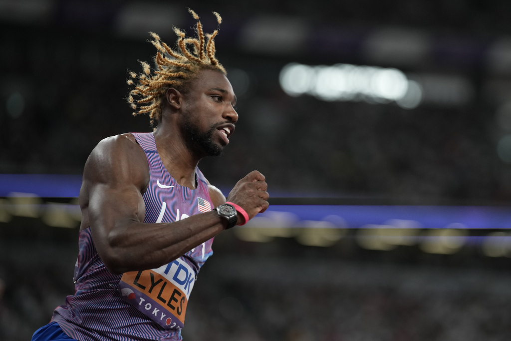 United States' Noah Lyles competes in the men's 200 meters heats at the World Athletics Championships in Tokyo, Thursday, Sept. 18, 2025. (AP Photo/Louise Delmotte)