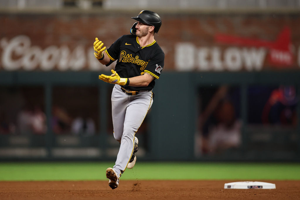 Pittsburgh Pirates' Spencer Horwitz reacts while rounding the bases after hitting a solo home run in the seventh inning of a baseball game against the Atlanta Braves, Friday, Sept. 26, 2025, in Atlanta. (AP Photo/Colin Hubbard)