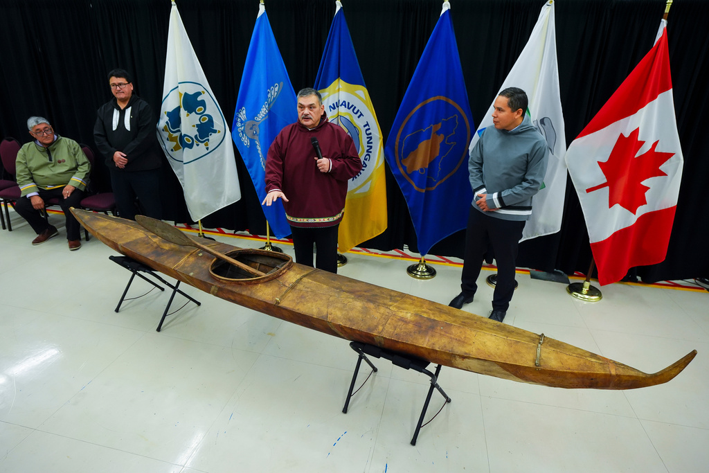 Paul Irngaut, Acting President of Nunavut Tunngavik Inc., left to right, Duane Smith, Chair and CEO of the Inuvialuit Regional Corp., Darrel Nasogaluak, Elder and Chair of Tuktoyaktuk Community Corp., and Natan Obed, President of Inuit Tapiriit Kanatami answer questions after the unveiling of a traditionally built Inuvialuit kayak and a selection of Inuit items at the Canadian Museum of History in Gatineau, Que., on Tuesday, Dec. 9, 2025. (Sean Kilpatrick /The Canadian Press via AP)