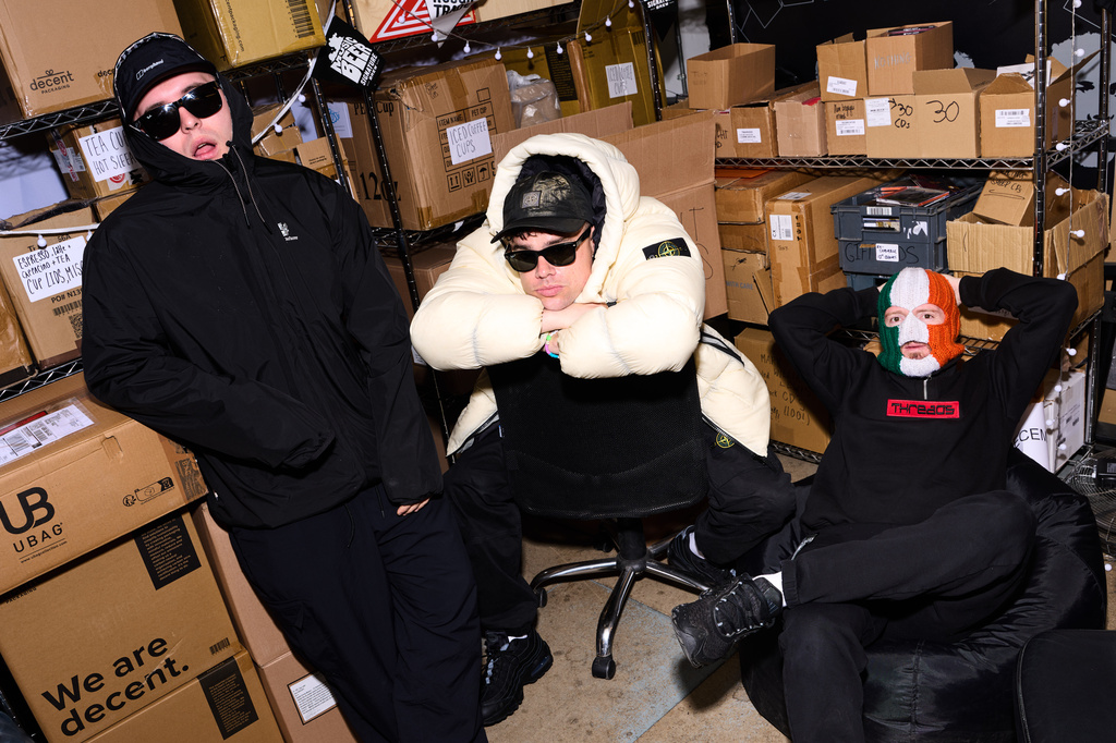 Liam Og O hAnnaidh, aka Mo Chara, from left, Naoise O Caireallain, aka Moglai Bap, J. J. O Dochartaigh, aka DJ Provai, from the band Kneecap pose for portrait photographs on Thursday, April 30, 2026, in London. (Photo by Scott A Garfitt/Invision/AP)