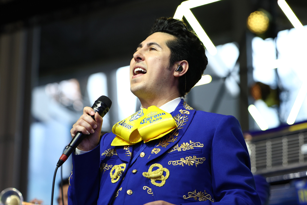The Los Angeles Rams Mariachi Band performs before an NFL football game against the Tampa Bay Buccaneers, Sunday, Nov. 23, 2025, in Inglewood, Calif. (AP Photo/Jessie Alcheh)
