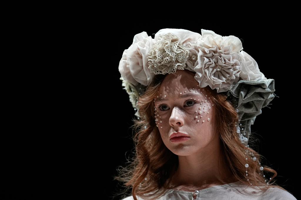 A model wears a creation by Design and Decorative and Applied Arts Department of the Moscow State Institute of Culture on a runway at the Moscow Fashion Week in Moscow, on Tuesday, March 17, 2026. (AP Photo/Alexander Zemlianichenko)