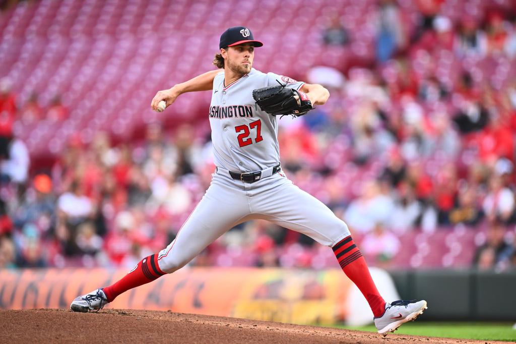 Washington Nationals pitcher Jake Irvin throws during the first inning of a baseball game against the Cincinnati Reds in Cincinnati, Wednesday, May 13, 2026. (AP Photo/Ben Jackson)