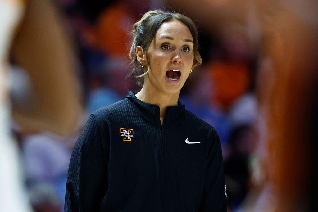 Tennessee head coach Kim Caldwell yells to her players during the first half of an NCAA college basketball game against Texas in Knoxville, Tenn., Sunday, Feb. 15, 2026. (AP Photo/Wade Payne)