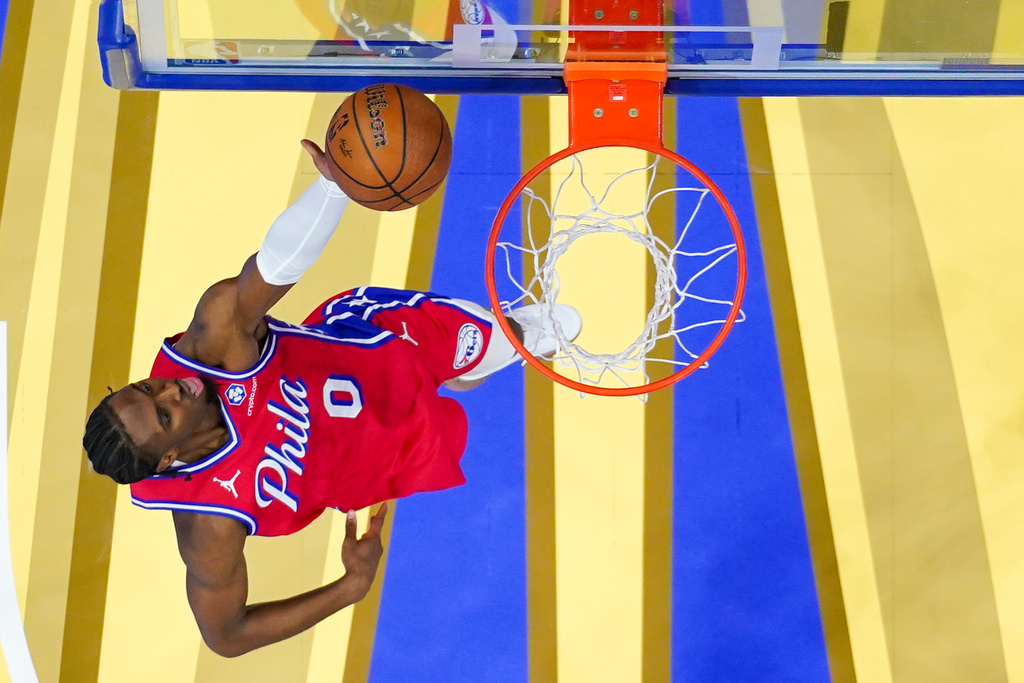 Philadelphia 76ers' Tyrese Maxey goes up for the shot during the first half of an NBA Cup basketball game against the Orlando Magic, Tuesday, Nov. 25, 2025, in Philadelphia. (AP Photo/Chris Szagola)