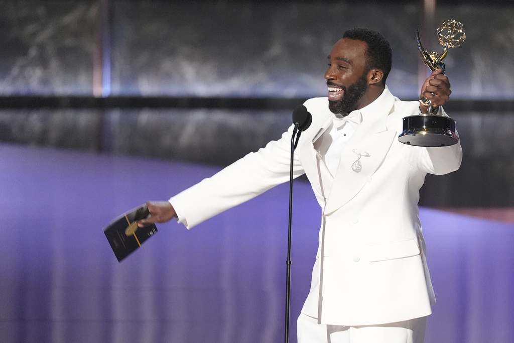Tramell Tillman accepts the award for outstanding supporting actor in a drama series for "Severance" during the 77th Primetime Emmy Awards on Sunday, Sept. 14, 2025, at the Peacock Theater in Los Angeles. (AP Photo/Chris Pizzello)