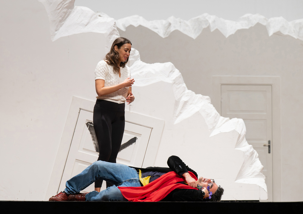 This image released by the Metropolitan Opera shows soprano Nadine Sierra, standing, rehearsing with director Rolando Villazón for his new production of Bellini’s “La Sonnambula" in New York on Sept. 23, 2025. (Jonathan Tichler/Metropolitan Opera via AP)