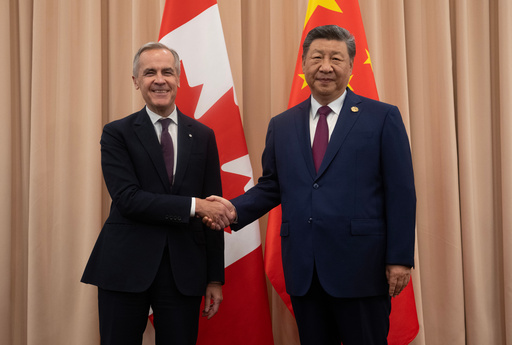 Canadian Prime Minister Mark Carney, left, shakes hands with Chinese President Xi Jinping at the start of a meeting in Gyeongju, South Korea, Friday, Oct. 31, 2025. (Adrian Wyld/The Canadian Press via AP) Canadian Prime Minister Mark Carney, left, shakes hands with Chinese President Xi Jinping at the start of a meeting in Gyeongju, South Korea, Friday, Oct. 31, 2025. (Adrian Wyld/The Canadian Press via AP)