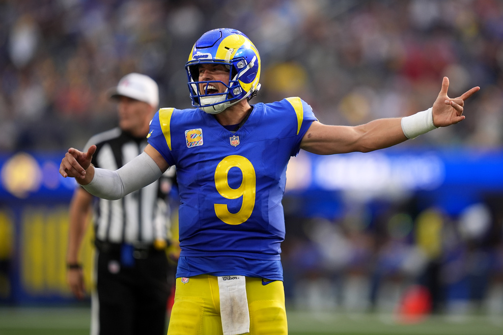 Los Angeles Rams quarterback Matthew Stafford (9) reacts toward teammates during the second half of an NFL football game against the Arizona Cardinals in Inglewood, Calif., Sunday, Oct. 18, 2026. (AP Photo/Gregory Bull)