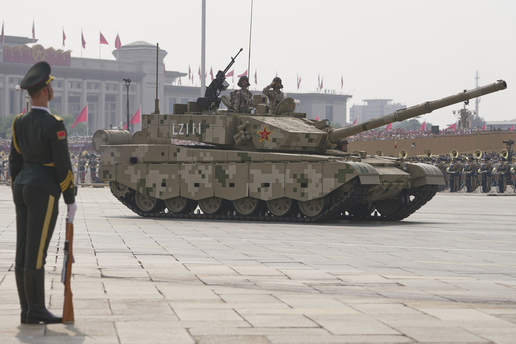 Armoured vehicles take part in a military parade to commemorate the 80th anniversary of Japan's World War II surrender held in front of Tiananmen Gate in Beijing, Wednesday, Sept. 3, 2025. (AP Photo/Andy Wong)