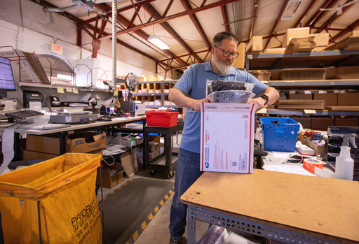 Terry Precision Cycling warehouse manager Luke Tremble packs orders at the company’s warehouse in Burlington, Vt., Tuesday, Oct. 28, 2025. (AP Photo/Amanda Swinhart) Terry Precision Cycling warehouse manager Luke Tremble packs orders at the company’s warehouse in Burlington, Vt., Tuesday, Oct. 28, 2025. (AP Photo/Amanda Swinhart)