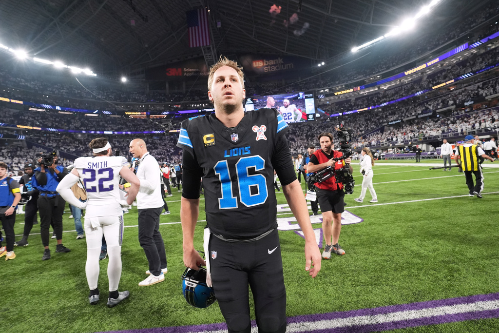 Detroit Lions quarterback Jared Goff walks off the field after the team's loss to the Minnesota Vikings in an NFL football game, Thursday, Dec. 25, 2025, in Minneapolis. (AP Photo/Abbie Parr)