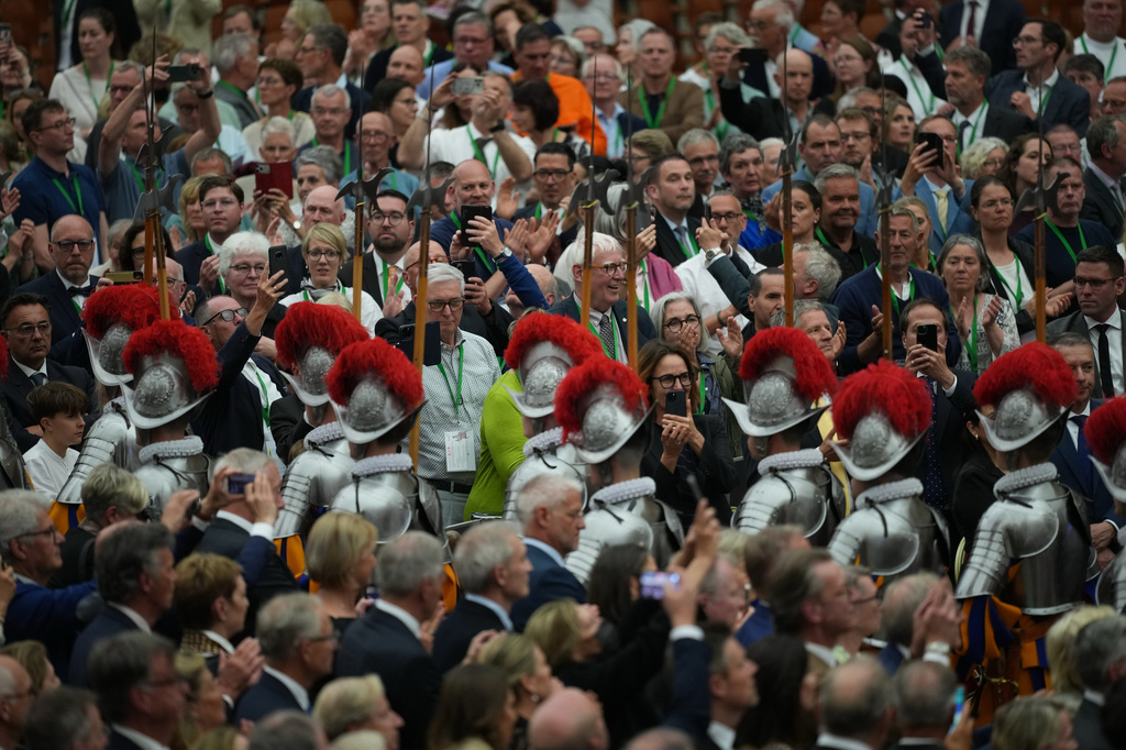 New Pontifical Swiss Guards attend a swearing-in ceremony in the Paul VI Hall at the Vatican, Wednesday, May 6, 2026. (AP Photo/Andrew Medichini)