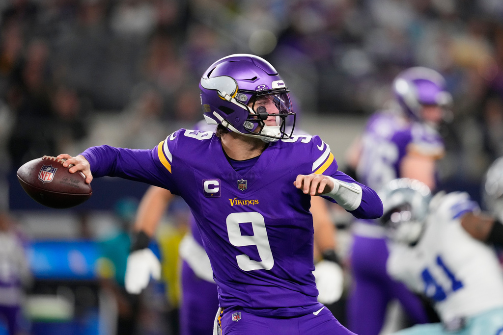 Minnesota Vikings quarterback J.J. McCarthy throws a pass during the second half of an NFL football game against the Dallas Cowboys Sunday, Dec. 14, 2025, in Arlington, Texas. (AP Photo/Tony Gutierrez)