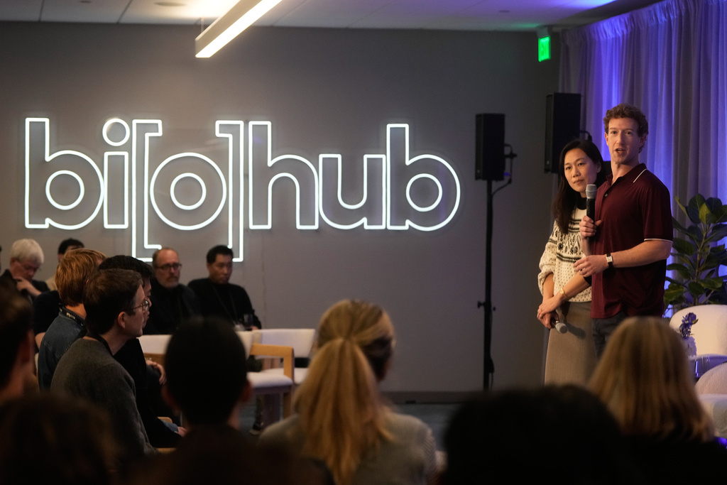 Meta CEO Mark Zuckerberg, right, speaks next to his wife, Priscilla Chan, co-founder and co-CEO of the Chan Zuckerberg Initiative (CZI), during an event at the Biohub Imaging Institute in Redwood City, Calif., Wednesday, Nov. 5, 2025. (AP Photo/Jeff Chiu)