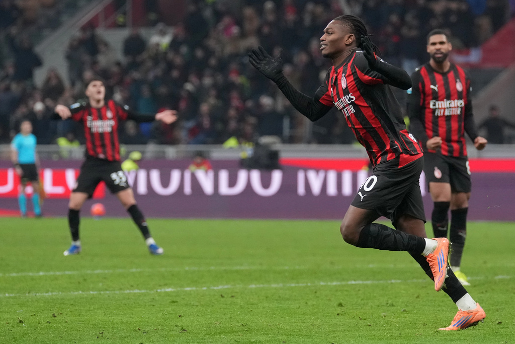 AC Milan's Rafael Leao celebrates after scoring his side's opening goal during the Serie A soccer match between AC Milan and Genoa, in Milan, Italy, Thursday, Jan. 8, 2026. (AP Photo/Antonio Calanni)