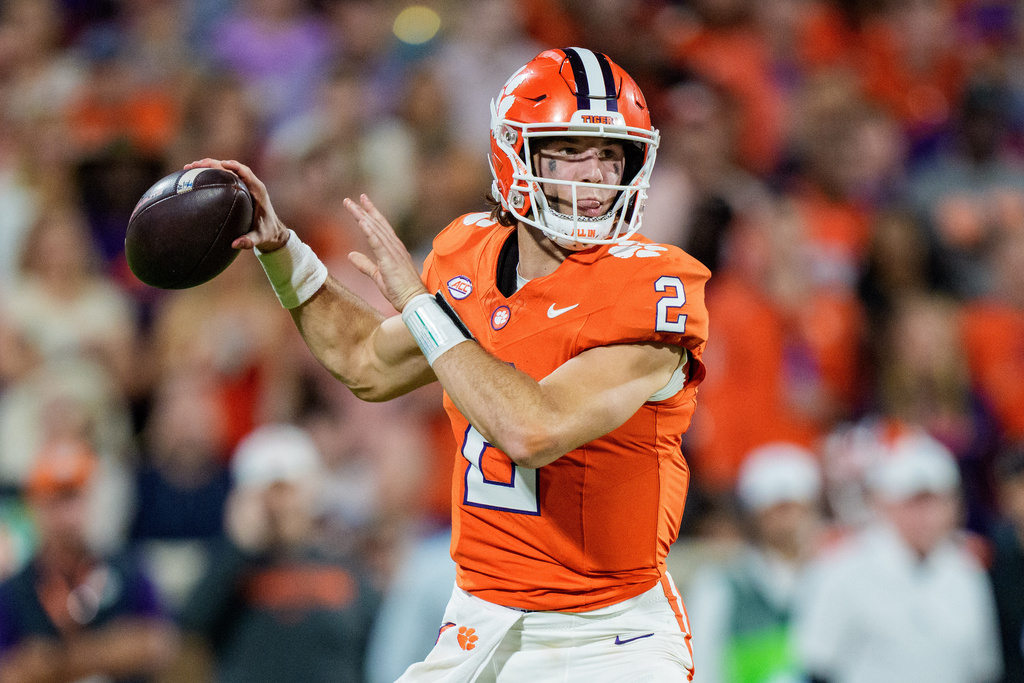 Clemson quarterback Cade Klubnik (2) passes the ball in the first half of an NCAA college football game against Florida State, Saturday, Nov. 8, 2025, in Clemson, S.C. (AP Photo/Jacob Kupferman)