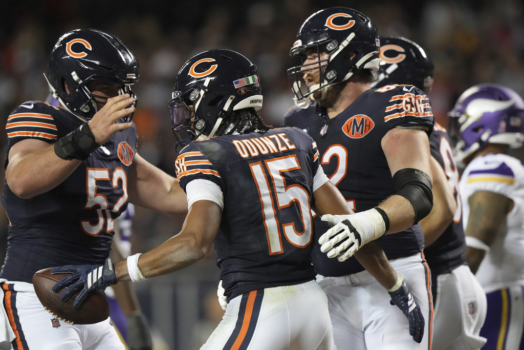 Chicago Bears wide receiver Rome Odunze (15) celebrates after scoring during the second half of an NFL football game Monday, Sept. 8, 2025, in Chicago. (AP Photo/Nam Y. Huh)