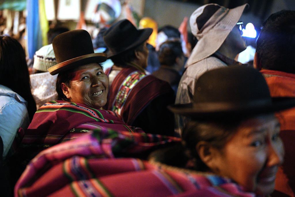 Suppoters of presidential candidate Rodrigo Paz celebrate after preliminary results showed him leading in the presidential runoff election in La Paz, Bolivia, Sunday, Oct. 19, 2025. (AP Photo/Ivan Valencia)