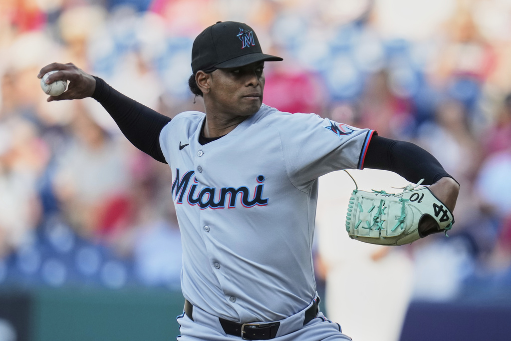 Miami Marlins starting pitcher Edward Cabrera pitches in the first inning of a baseball game against the Cleveland Guardians in Cleveland, Thursday, Aug. 14, 2025. (AP Photo/Sue Ogrocki)