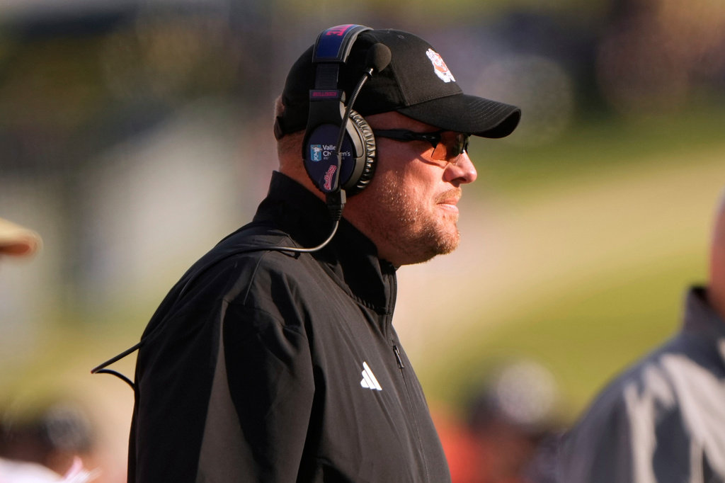 FILE - Fresno State head coach Matt Entz watches the first half of an NCAA college football game against Kansas, Aug. 23, 2025, in Lawrence, Kan. (AP Photo/Charlie Riedel, File)