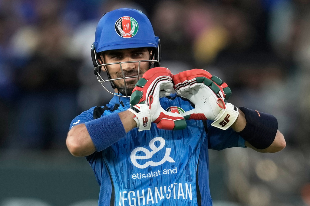 Afghanistan's Rahmanullah Gurbaz celebrates his fifty runs during the first ODI cricket match between Afghanistan and India in Dharamshala, India, Saturday, June 13, 2026. (AP Photo/Ashwini Bhatia)