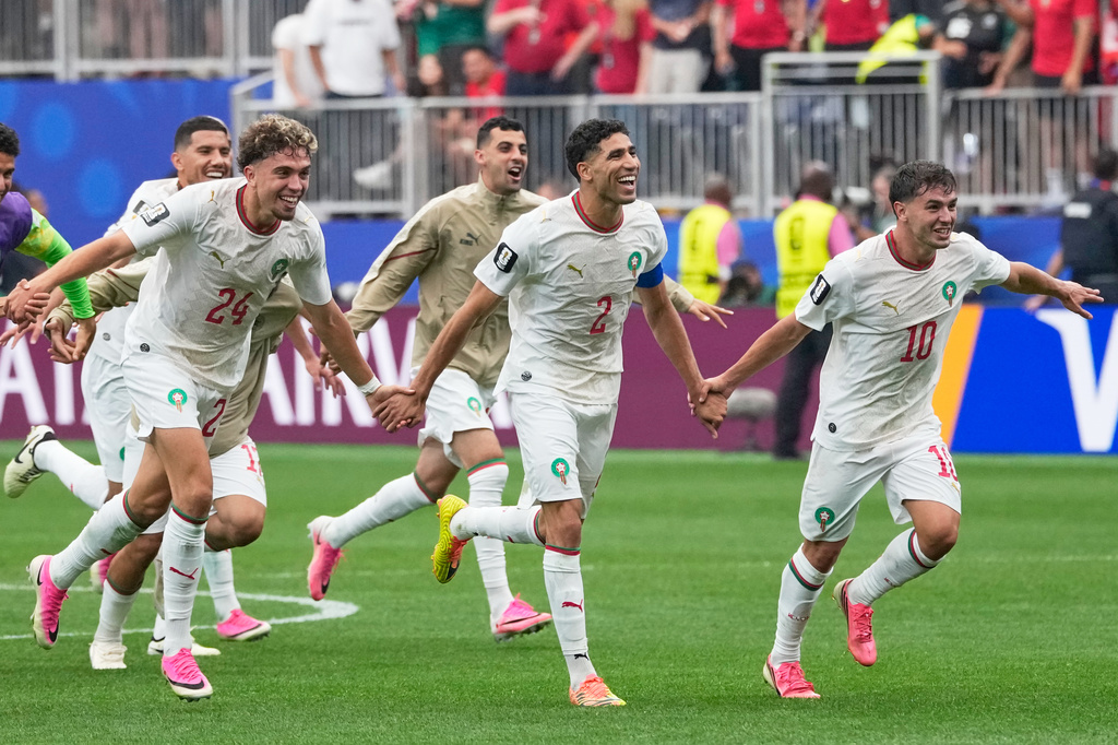 Players of Morocco react after the World Cup round of 16 soccer match against Canada in Houston, Saturday, July 4, 2026. (AP Photo/David J. Phillip)