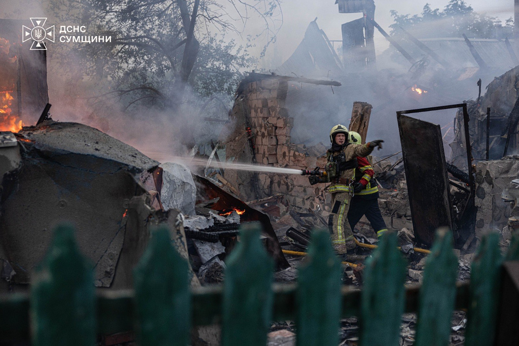 In this photo provided by the Ukrainian Emergency Service, firefighters put out a fire at private homes following a Russian air attack in Sumy, Ukraine, Wednesday, Sept. 16, 2026. (Ukrainian Emergency Service via AP)