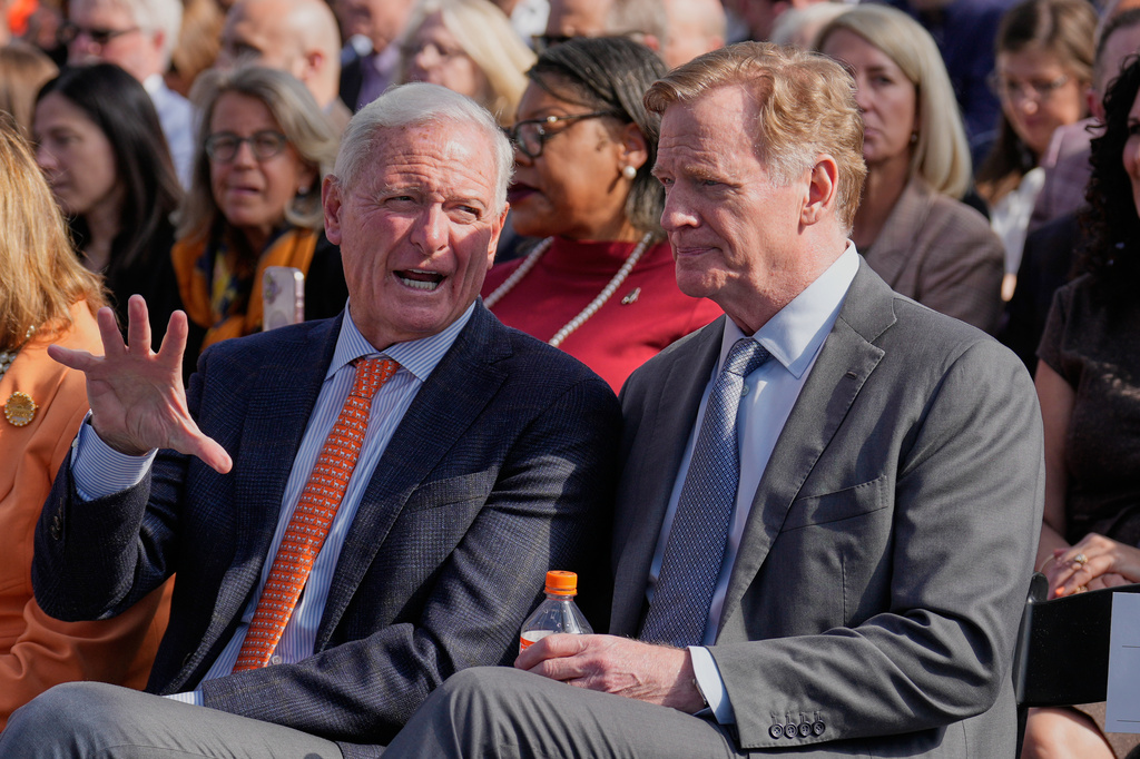 Jimmy Haslam, left, one of the principal owners of the Cleveland Browns, talks with NFL Commissioner Roger Goodell , right, before groundbreaking ceremonies for the new Browns stadium in Brook Park, Ohio, Thursday, April 30, 2026. (AP Photo/Sue Ogrocki)