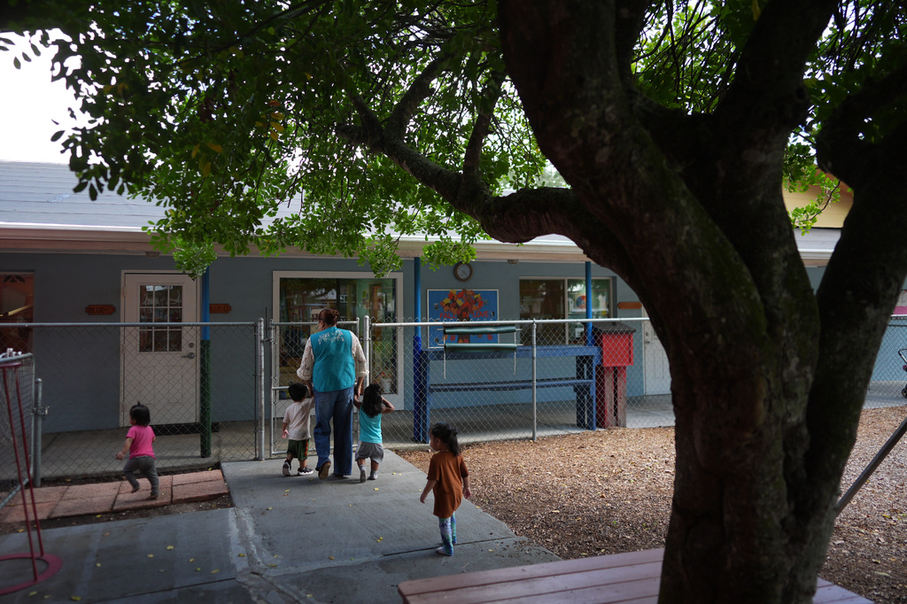 A teacher escorts young children to their classroom at a Head Start preschool in Immokalee, Fla., Thursday, Sept. 10, 2026. (AP Photo/Rebecca Blackwell)