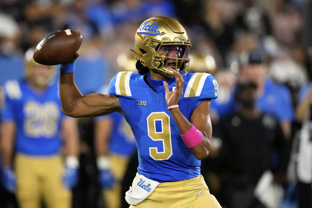 UCLA quarterback Nico Iamaleava passes during the first half of an NCAA college football game against Utah, Saturday, Aug. 30, 2025, in Pasadena, Calif. (AP Photo/Mark J. Terrill)
