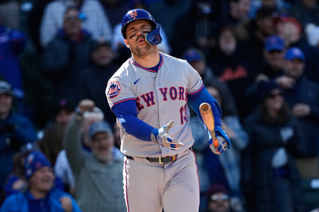 New York Mets' Luis Torrens reacts after striking out swinging during the 10th inning of a baseball game against the Chicago Cubs in Chicago, Sunday, April 19, 2026. (AP Photo/Nam Y. Huh)
