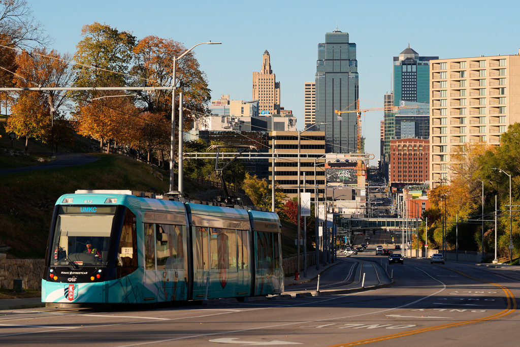 A streetcar runs along Main Street near the 18th and Vine district Friday, Nov. 7, 2025, in Kansas City, Mo. (AP Photo/Charlie Riedel)