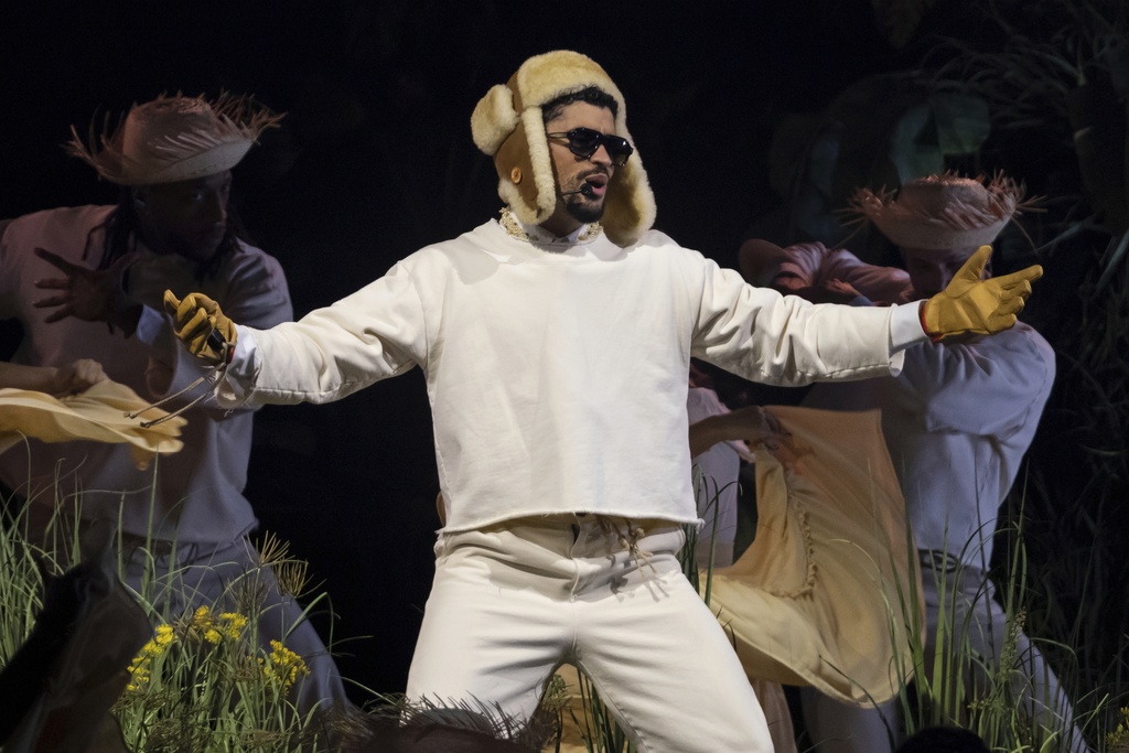 Bad Bunny performs during the final concert of his summer residency in his homeland at the Coliseo de Puerto Rico Jose Miguel Agrelot, in San Juan, Puerto Rico, Saturday, Sept. 20, 2025. (AP Photo/Alejandro Granadillo)