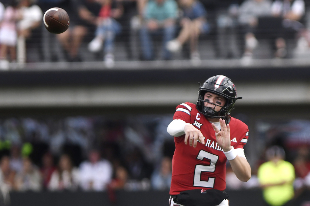 Texas Tech quarterback Behren Morton (2) throws a pass during the first half of an NCAA college football game against Oregon State, Saturday, Sept. 13, 2025, in Lubbock, Texas. (AP Photo/Annie Rice)
