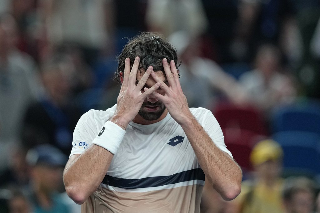 Valentin Vacherot of Monaco reacts after defeating Novak Djokovic of Serbia in the men's singles semifinal match of the Shanghai Masters tennis tournament at Qizhong Forest Sports City Tennis Center, in Shanghai, China, Saturday, Oct. 11, 2025. (AP Photo/Andy Wong)