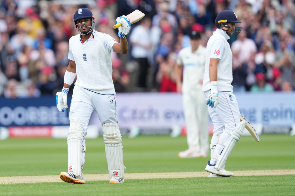 England's Emilio Gay celebrates his half century during the second day of the test match between England and New Zealand at Lord's cricket ground in London, Friday, June 5, 2026. (AP Photo/Kirsty Wigglesworth)